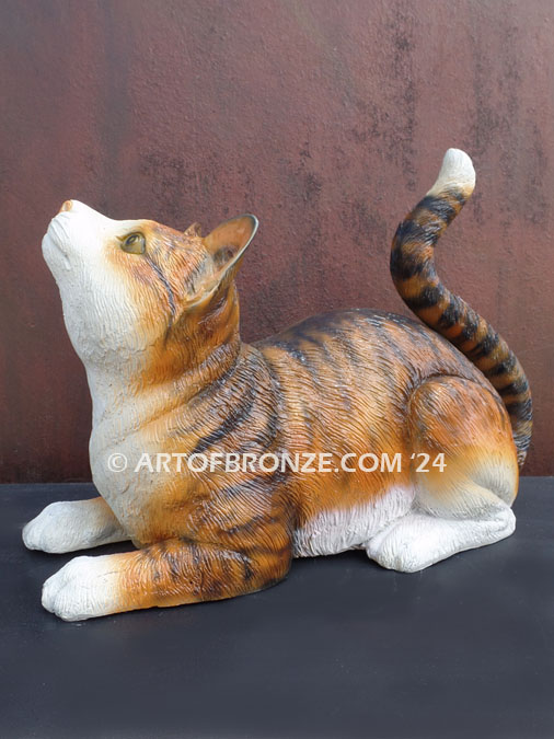 Chanel resting Calidy, Calico life-size cat bronze sculpture
