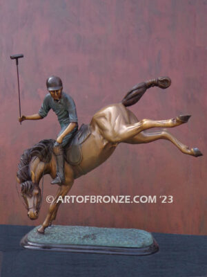 Change of Direction bronze sculpture of polo player riding his leaping polo pony attached to a marble base