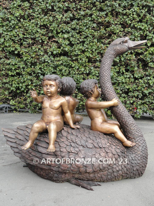 Fantasy bronze sculpture of playing cherubs on graceful swan
