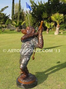 Chimp Golfer special edition, gallery quality chimpanzee dressed up like golfer hitting golf ball
