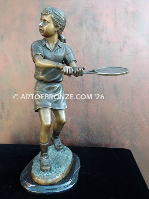 Chrissie bronze statue of young girl playing tennis