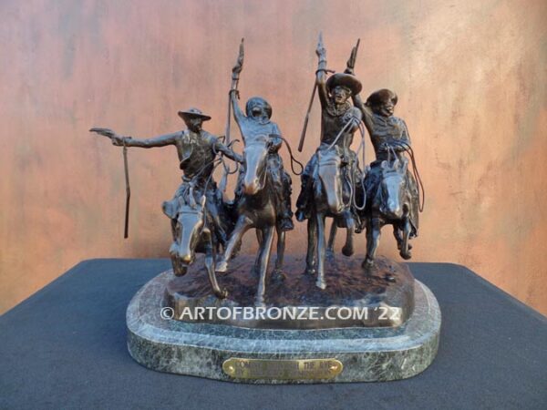 Coming Thru the Rye bronze sculpture after Frederic Remington featuring four horseman on galloping horses