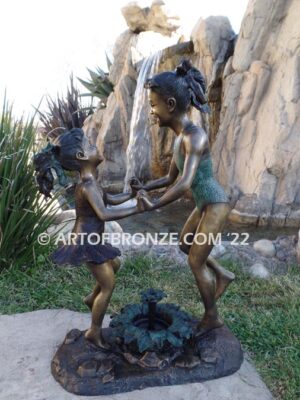 Dance Around bronze sculpture of girls in bathing suits dancing around