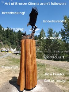 Dinner for Two statue of a life-size bald eagle feeding its baby eaglet in nest