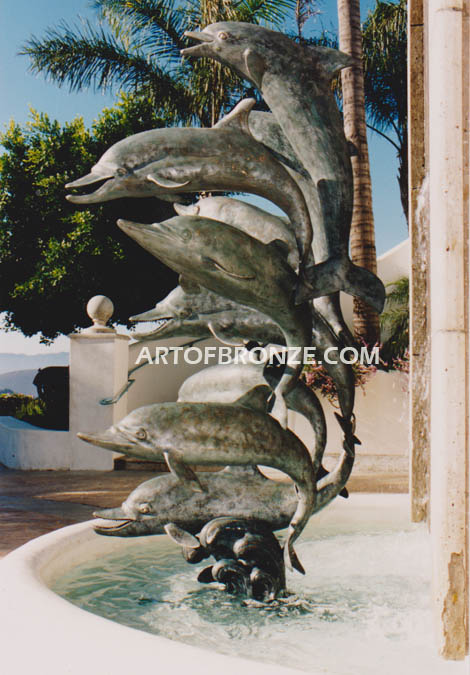 Dolphin Jubilation bronze statue monument of 9 nine leaping dolphins over 8 ft. tall