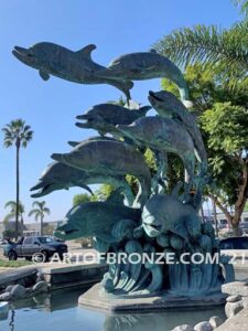 Dolphin Jubilation bronze Art in Public places monument of 11 eleven leaping dolphins over 10 ft. tall