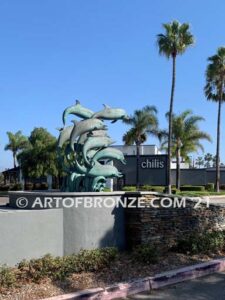 Dolphin Jubilation bronze Art in Public places monument of 11 eleven leaping dolphins over 10 ft. tall