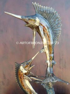 Double Whammy marlin and sailfish leaping through the air bronze statue
