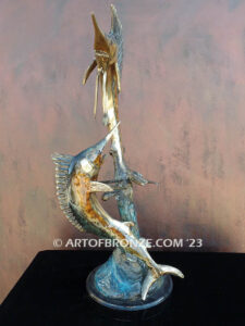 Double Whammy marlin and sailfish leaping through the air bronze statue