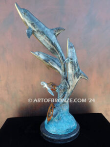 Dream Reef dolphins swimming with seat turtle bronze statue