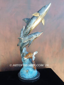 Dream Reef dolphins swimming with seat turtle bronze statue