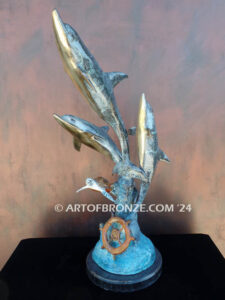 Dream Reef dolphins swimming with seat turtle bronze statue