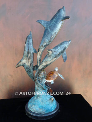 Dream Reef dolphins swimming with seat turtle bronze statue