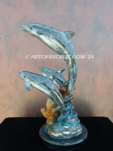 Dream Reef dolphins swimming with seat turtle bronze statue