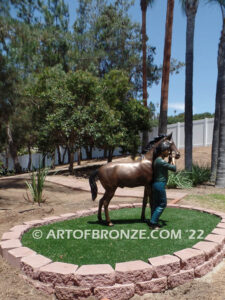 Dreams Come True bronze sculpture of girl petting her pony horse