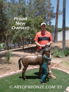 Dreams Come True bronze sculpture of girl petting her pony horse