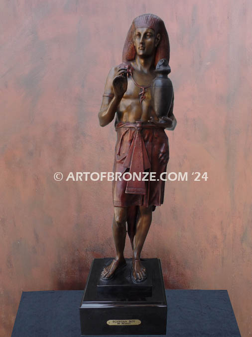 Egyptian Boy holding vase/vessel indoor bronze statue after Émile Louis Picault.