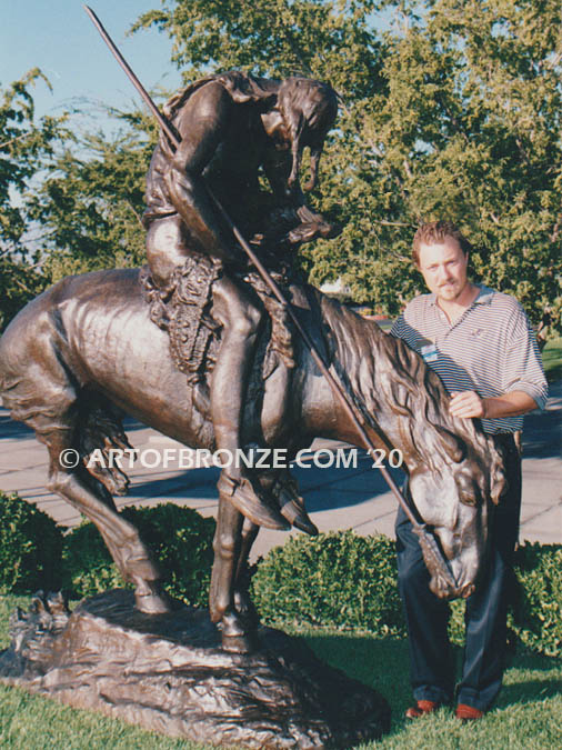 End of the Trail bronze 8.5 ft. tall bronze sculpture after James Earle Fraser. Native American on exhausted horse. Monumental western art bronze statue.