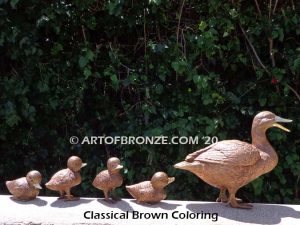 Family Leader outdoor bronze sculptures of walking duck and her ducklings