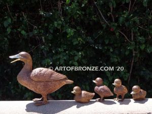 Family Leader outdoor bronze sculptures of walking duck and her ducklings