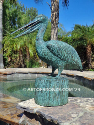 Fisherman bronze sculpture of tranquil pelican on bronze piling