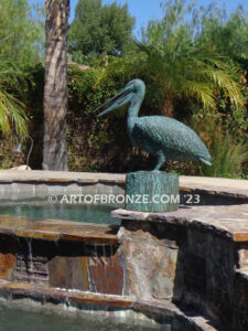 Fisherman bronze sculpture of tranquil pelican on bronze piling