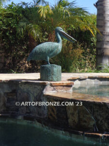 Fisherman bronze sculpture of tranquil pelican on bronze piling