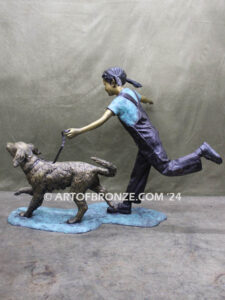 Friends for life outdoor garden bronze sculpture of young girl running with dog