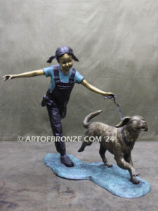 Friends for life outdoor garden bronze sculpture of young girl running with dog