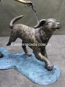 Friends for life outdoor garden bronze sculpture of young girl running with dog