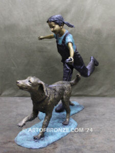 Friends for life outdoor garden bronze sculpture of young girl running with dog