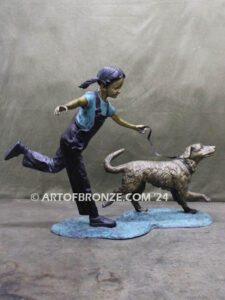 Friends for life outdoor garden bronze sculpture of young girl running with dog