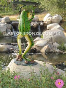 Frog Under Leaf gallery quality standing frog holding up leaf umbrella to shelter from water fountain