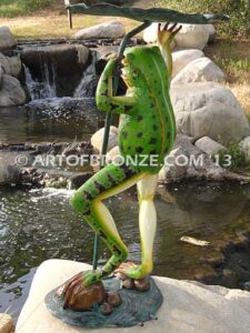 Frog Under Leaf gallery quality standing frog holding up leaf umbrella to shelter from water fountain