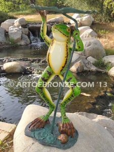 Frog Under Leaf gallery quality standing frog holding up leaf umbrella to shelter from water fountain