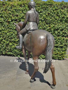 Future Champions equestrian show jumper horse and girl rider bronze statue