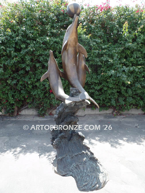 Game Play monumental fine art gallery bronze sculpture of three leaping dolphins