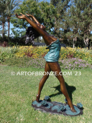 garden breeze woman dancing across water lilies bronze statue