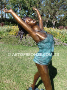 garden breeze woman dancing across water lilies bronze statue