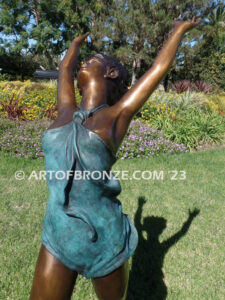 garden breeze woman dancing across water lilies bronze statue