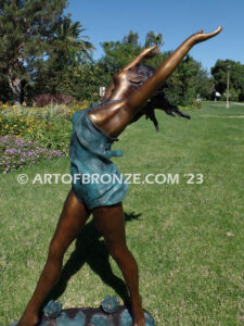 garden breeze woman dancing across water lilies bronze statue