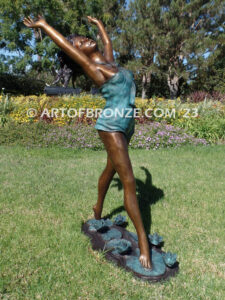 garden breeze woman dancing across water lilies bronze statue