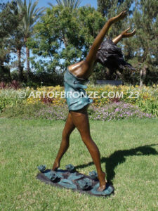 garden breeze woman dancing across water lilies bronze statue