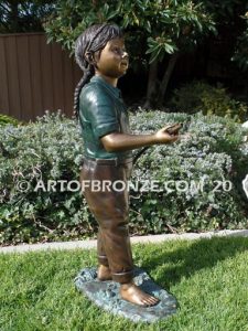 Garden Help outdoor bronze sculpture of standing girl with watering hose