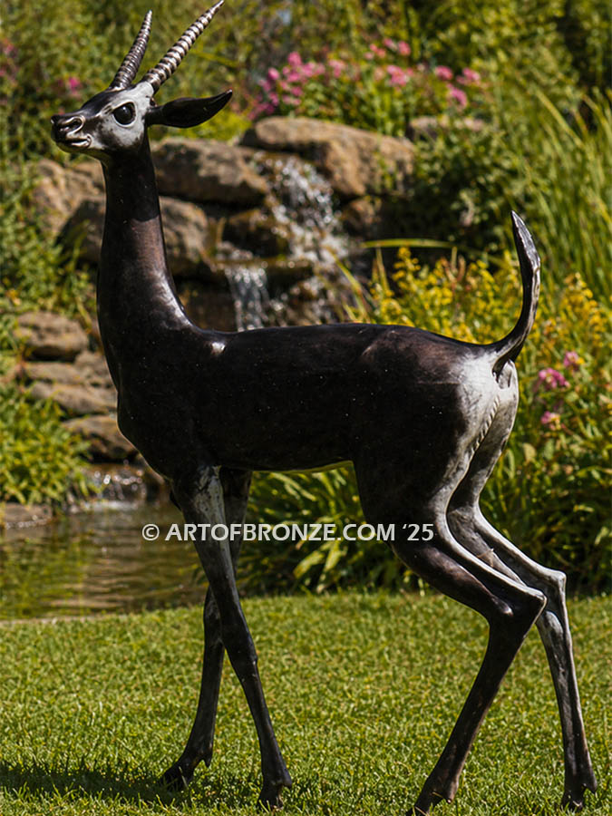 Gazelle quality outdoor bronze statue standing gazelle with head turned and curved horns