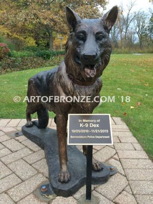 German Shepherd outdoor monumental bronze canine statue standing on alert with mouth open