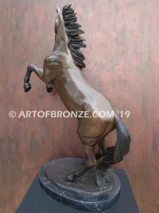 Glorious sculpture of wild reared horse attached to a marble base