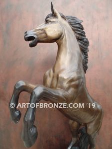 Glorious sculpture of wild reared horse attached to a marble base