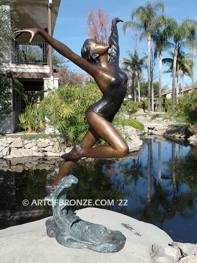 Harmony Light the art of dance and ballet bronze statue showing leaping ballerina