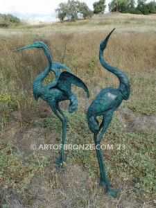 Heron Pair lost wax casting of pair of cranes for fountain